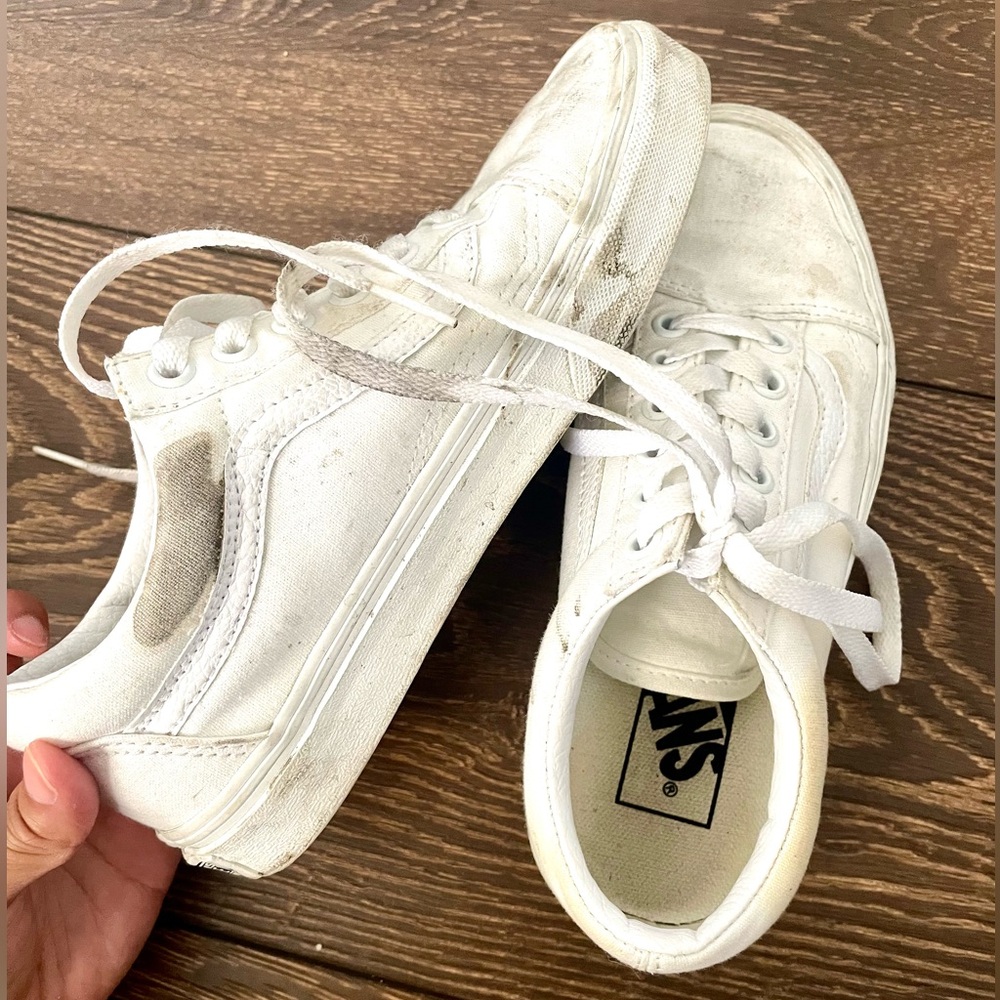 Woman’s white Vans